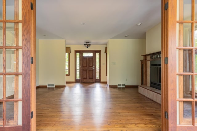 1477 E Hastings Lake Rd, Jonesville, MI 49250 - foyer entrance with wood finished floors and baseboards