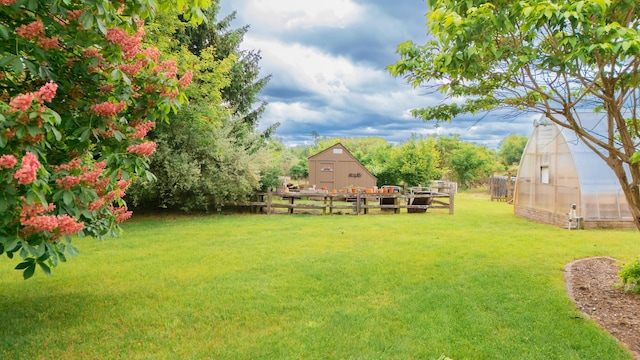 1477 E Hastings Lake Rd, Jonesville, MI 49250 - view of yard with an outbuilding, a greenhouse, and a barn