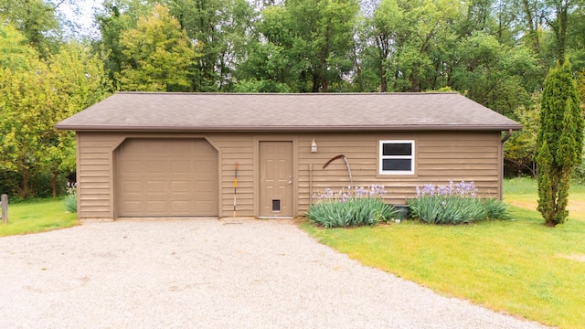 1477 E Hastings Lake Rd, Jonesville, MI 49250 - garage featuring driveway