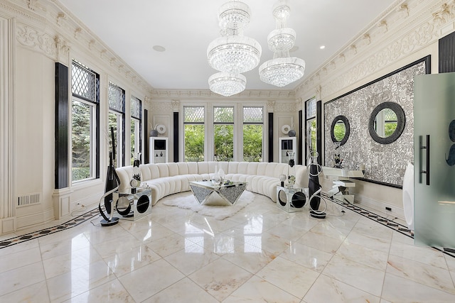 exercise area with a chandelier, crown molding, and a healthy amount of sunlight