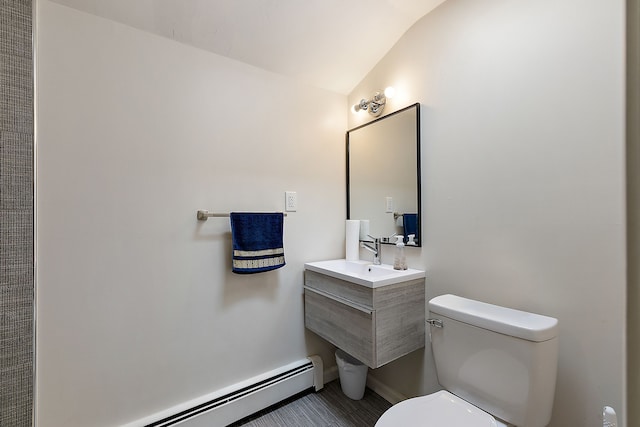 bathroom featuring a baseboard heating unit, toilet, sink, and vaulted ceiling