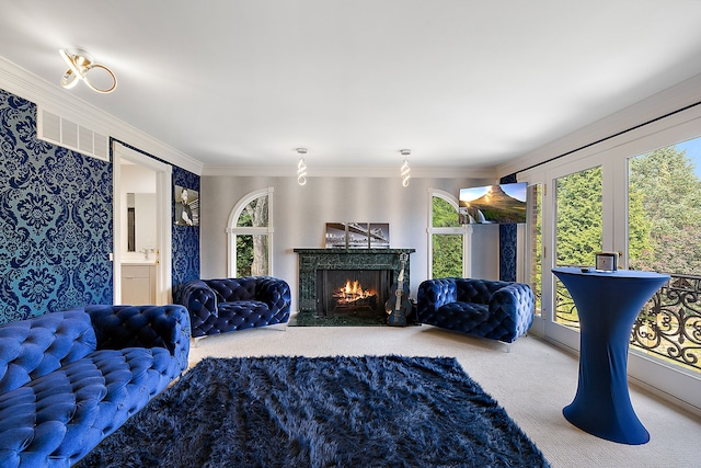 living room with carpet and ornamental molding