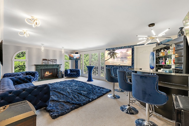 living room with crown molding and carpet