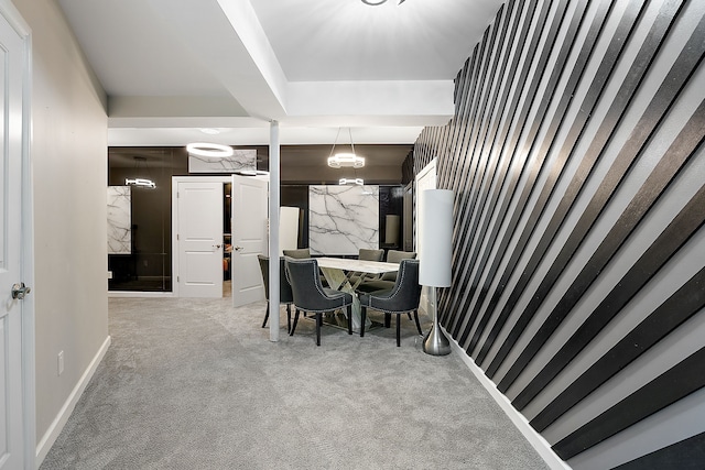 dining room featuring light colored carpet