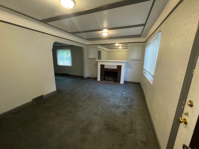 unfurnished living room with a fireplace