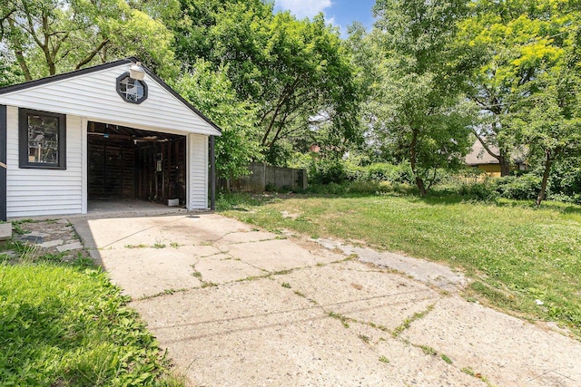 garage featuring a yard