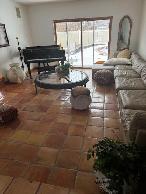 tiled living area with visible vents