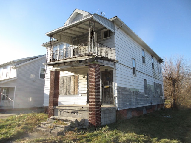 exterior space with a balcony