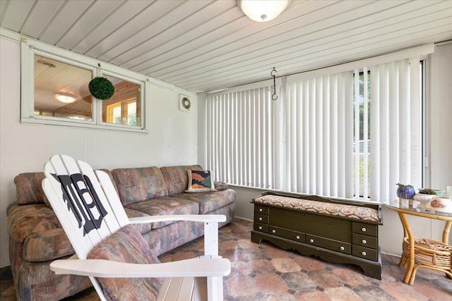 sunroom featuring wood ceiling