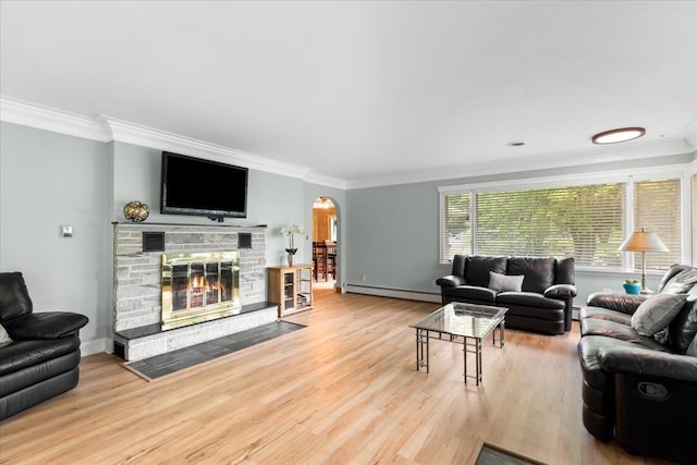 living room with hardwood / wood-style flooring, ornamental molding, and baseboard heating