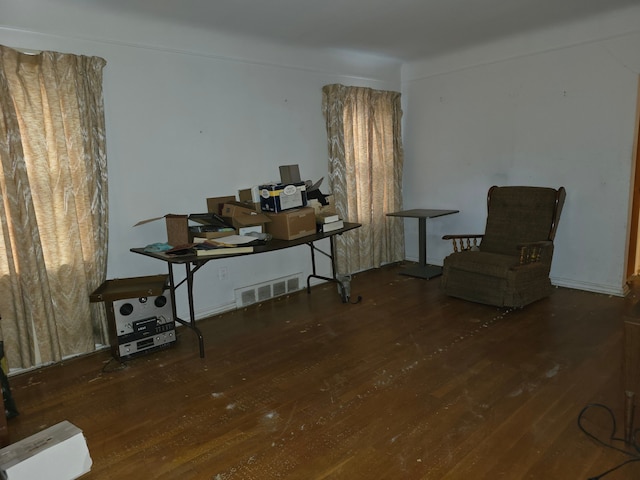 living area with dark wood-type flooring