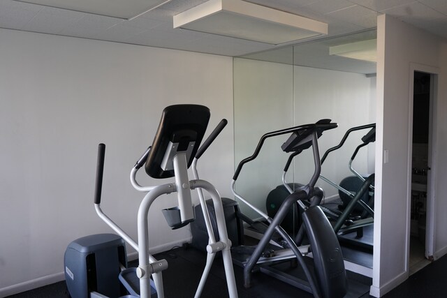 8900 E Jefferson Ave Unit 624, Detroit, MI 48214 - workout area with baseboards