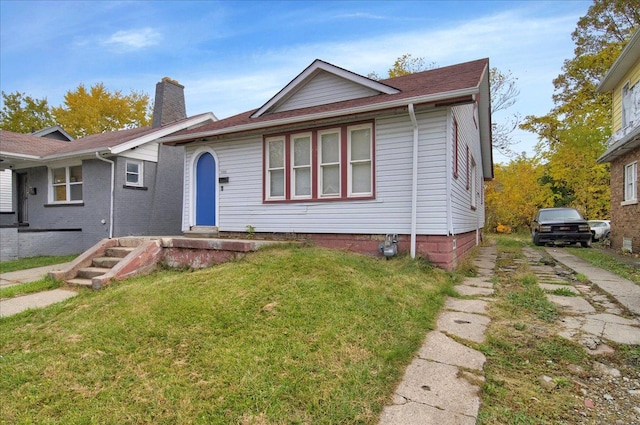 view of front of home with a front yard