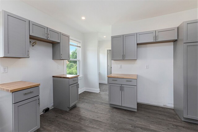 392 Philip St, Detroit, MI 48215 - kitchen featuring butcher block countertops, gray cabinetry, dark wood-style flooring, recessed lighting, and baseboards