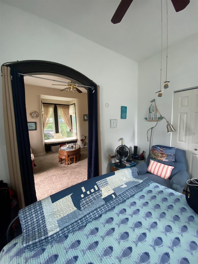 bedroom featuring ceiling fan and carpet floors