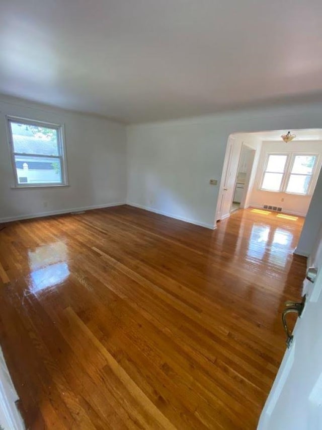 spare room featuring hardwood / wood-style flooring