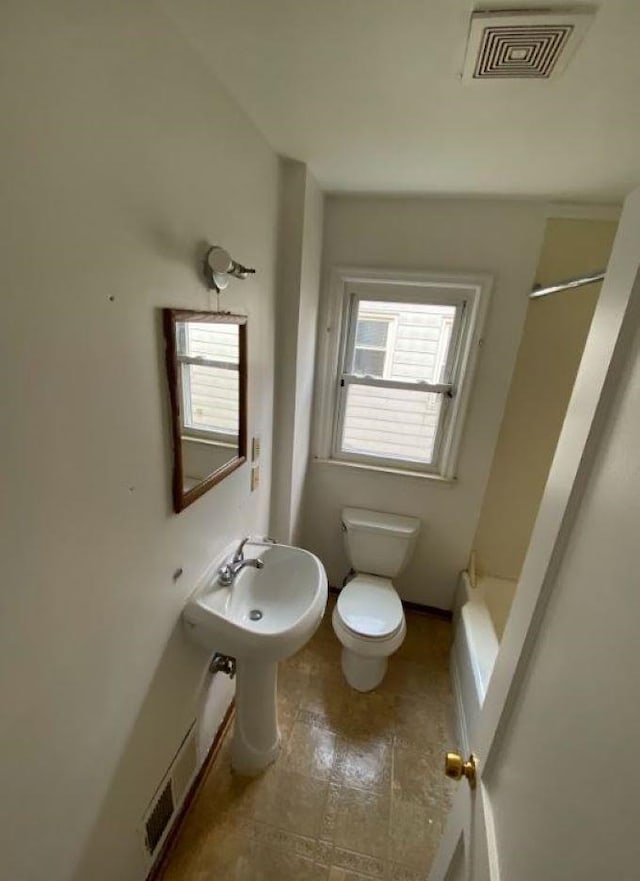 bathroom featuring toilet