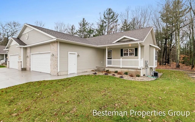 ranch-style home featuring a porch, central AC unit, a garage, and a front lawn