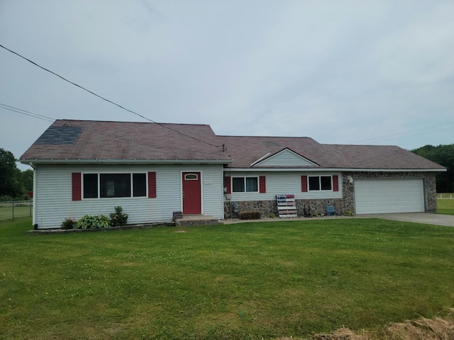 single story home with a front lawn and a garage