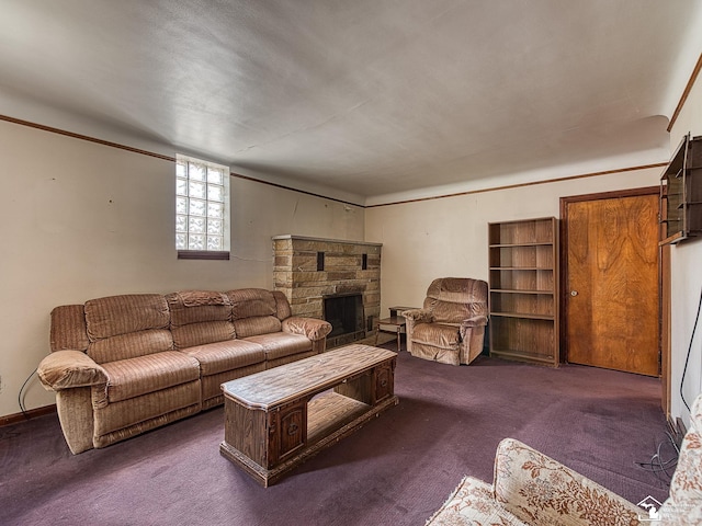 living room with a fireplace and dark carpet