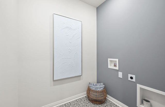 clothes washing area with electric dryer hookup, hookup for a washing machine, and tile patterned floors