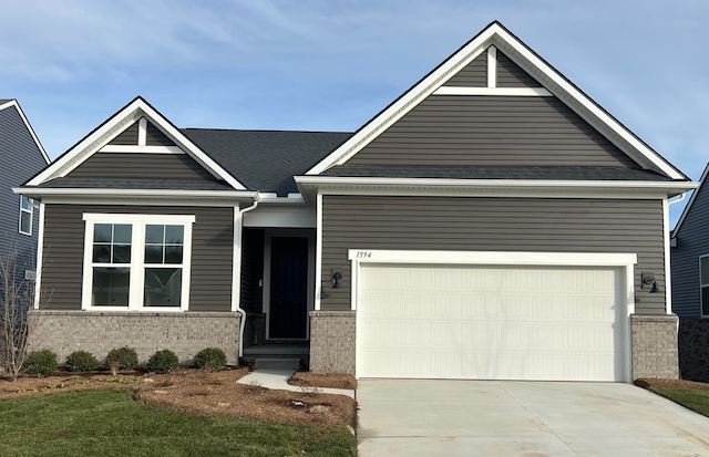 craftsman house featuring a garage