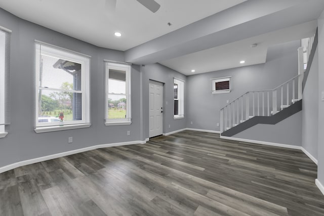 entrance foyer with ceiling fan and dark hardwood / wood-style floors