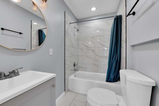 full bathroom featuring shower / tub combo with curtain, vanity, and toilet