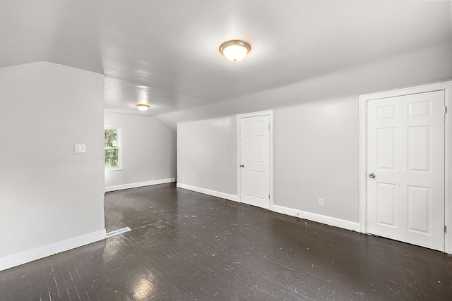 bonus room featuring vaulted ceiling