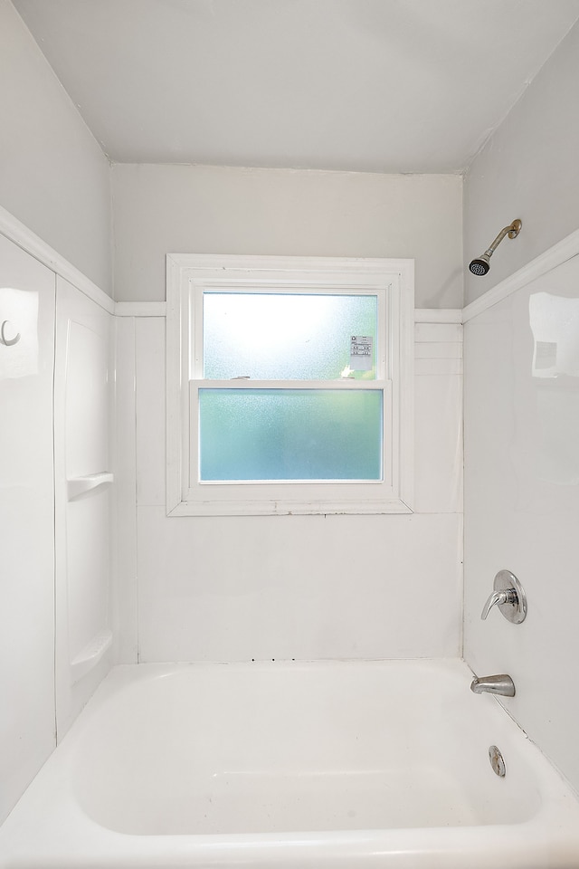 bathroom with shower / bath combination