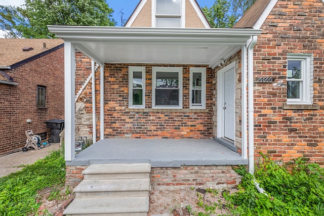 doorway to property featuring a porch