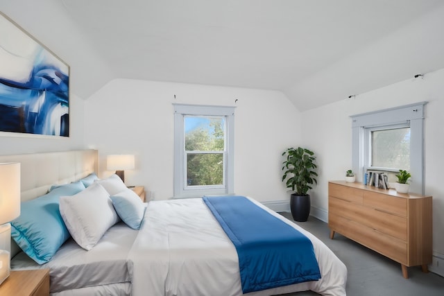 bedroom featuring lofted ceiling