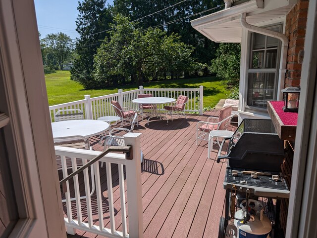 3641 Green Lake Rd, West Bloomfield, MI 48324 - deck featuring outdoor dining area and a yard