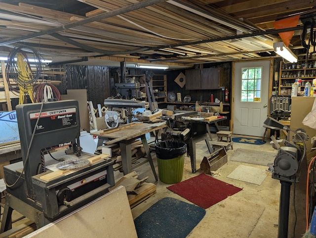 basement with a workshop area