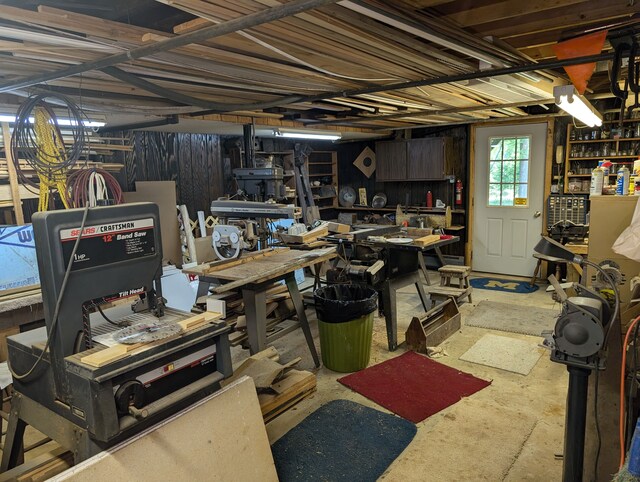 3641 Green Lake Rd, West Bloomfield, MI 48324 - below grade area with a workshop area