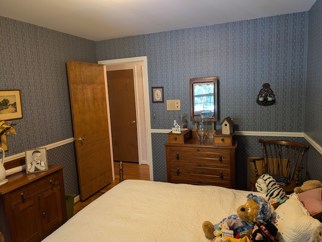 bedroom with wood-type flooring