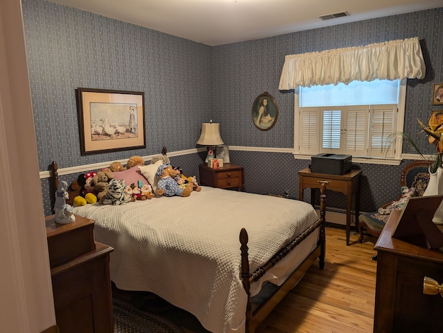 bedroom featuring light hardwood / wood-style flooring