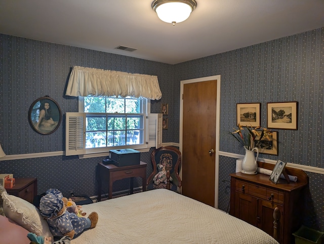 bedroom with baseboard heating