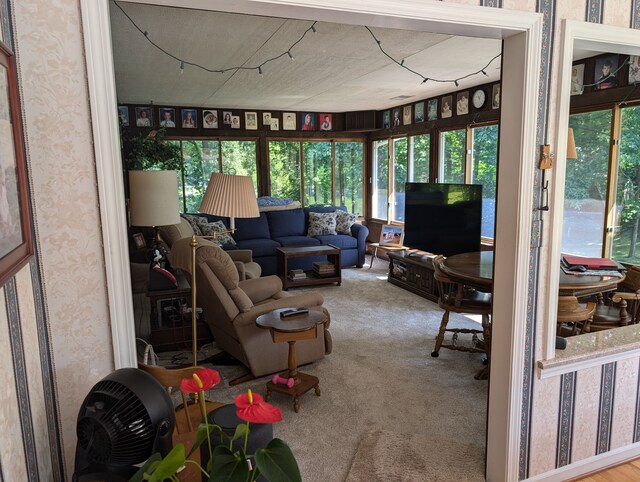3641 Green Lake Rd, West Bloomfield, MI 48324 - sunroom featuring carpet floors, plenty of natural light, and wallpapered walls