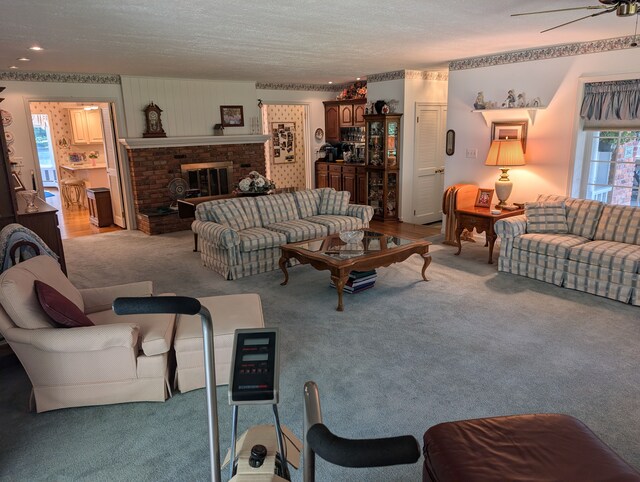 3641 Green Lake Rd, West Bloomfield, MI 48324 - living area with healthy amount of natural light, carpet, a ceiling fan, and a textured ceiling