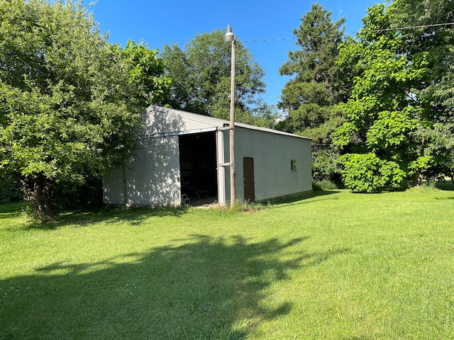 11424 W Corunna Rd, Lennon, MI 48449 - view of green lawn with an outbuilding