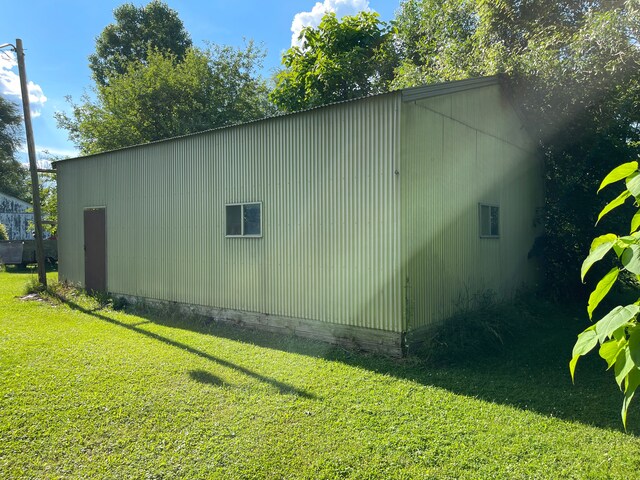 11424 W Corunna Rd, Lennon, MI 48449 - view of property exterior featuring a yard