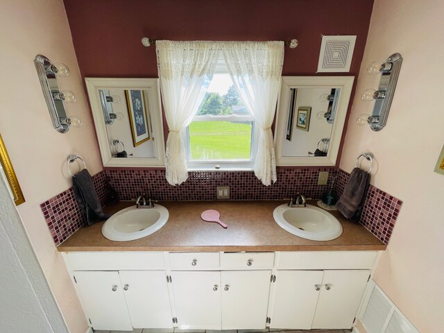 11424 W Corunna Rd, Lennon, MI 48449 - full bathroom featuring decorative backsplash and double vanity