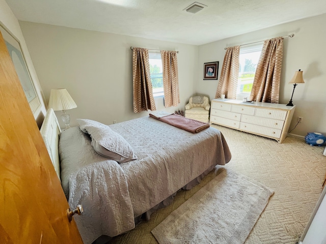 11424 W Corunna Rd, Lennon, MI 48449 - bedroom with light colored carpet and baseboards