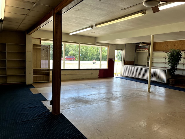 11424 W Corunna Rd, Lennon, MI 48449 - garage featuring ceiling fan