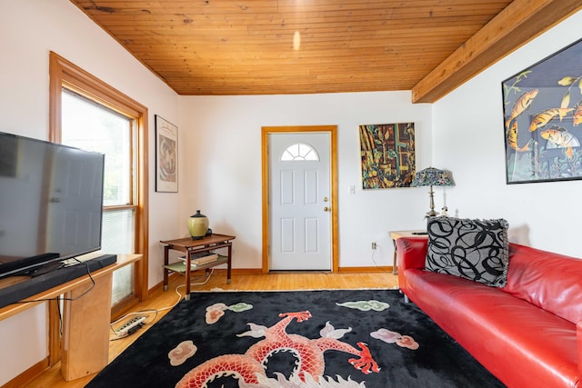 living room featuring beam ceiling, wood ceiling, and light wood-type flooring