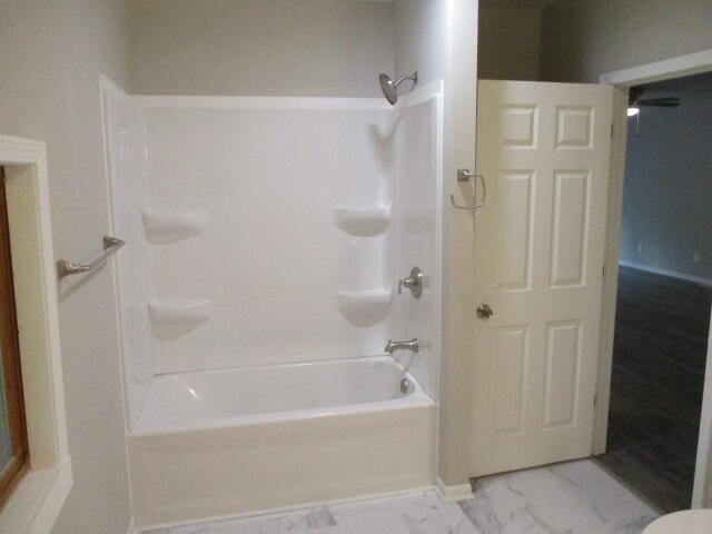 bathroom featuring bathing tub / shower combination