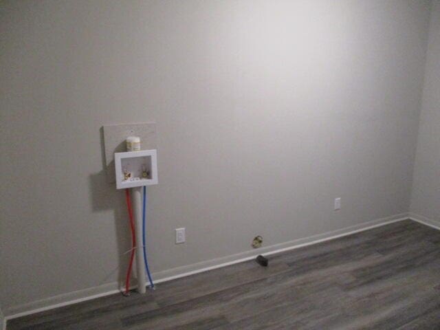 laundry area featuring hookup for a washing machine and dark wood-type flooring