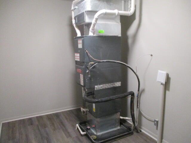 utility room with heating unit