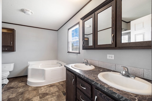 bathroom with a bath, crown molding, a textured ceiling, toilet, and vanity